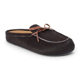 Dark brown cow hair clog with a moc-style apron toe, decorative leather bow, and backless silhouette shown on a white background.