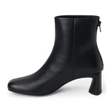 Black leather ankle boot with a square toe, low flared heel, and side zipper shown on a white background.