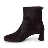 Dark purple cow hair ankle boot with a square toe, low flared heel, and side zipper shown on a white background.