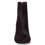 Dark purple cow hair ankle boot with a square toe, low flared heel, and side zipper shown on a white background.