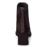 Dark purple cow hair ankle boot with a square toe, low flared heel, and side zipper shown on a white background.