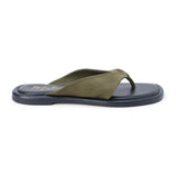 Green suede flip flop sandal with wide strap and toe loop shown on a white background.