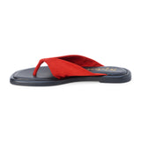 Red suede flip flop sandal with wide strap and toe loop shown on a white background.
