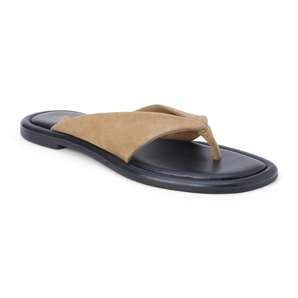 Tan suede flip flop sandal with wide strap and toe loop shown on a white background.