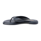 Black leather flip flop sandal with wide strap and toe loop shown on a white background.