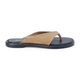Tan suede flip flop sandal with wide strap and toe loop shown on a white background.