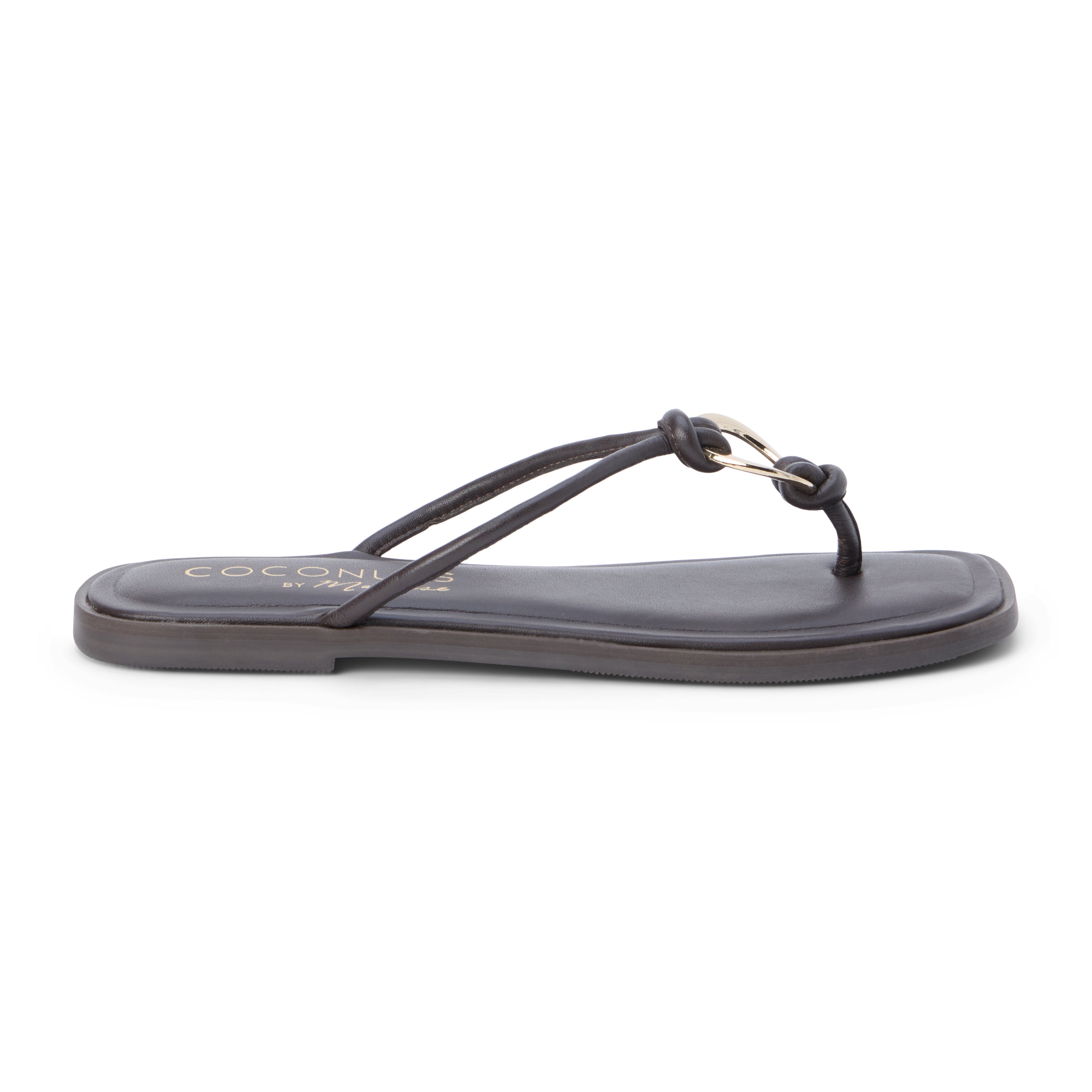 Brown leather thong sandal with metal ring detail and flat sole shown on a white background.