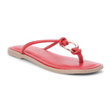 Red leather thong sandal with metal ring detail and flat sole shown on a white background.