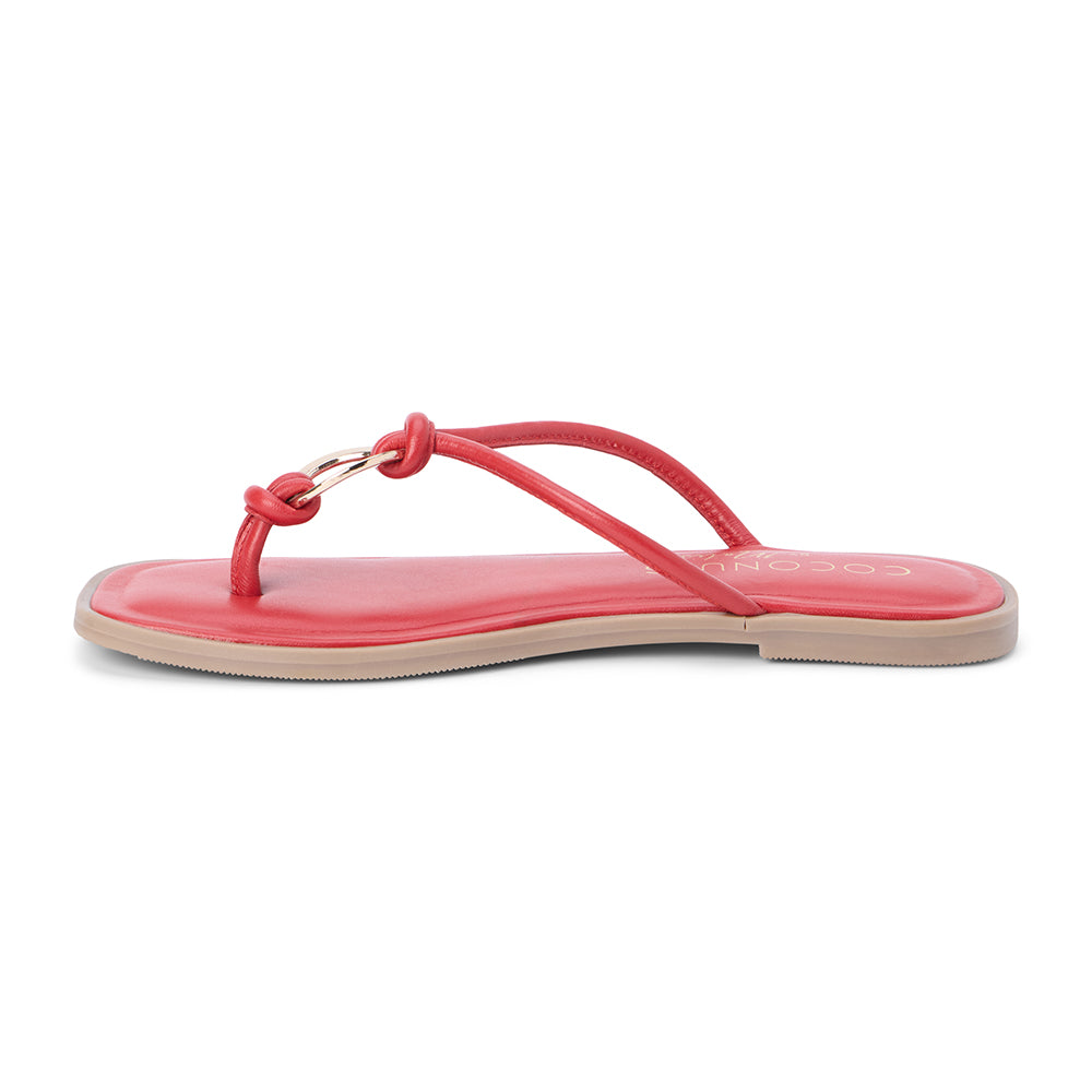 Red leather thong sandal with metal ring detail and flat sole shown on a white background.