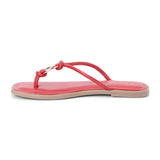 Red leather thong sandal with metal ring detail and flat sole shown on a white background.