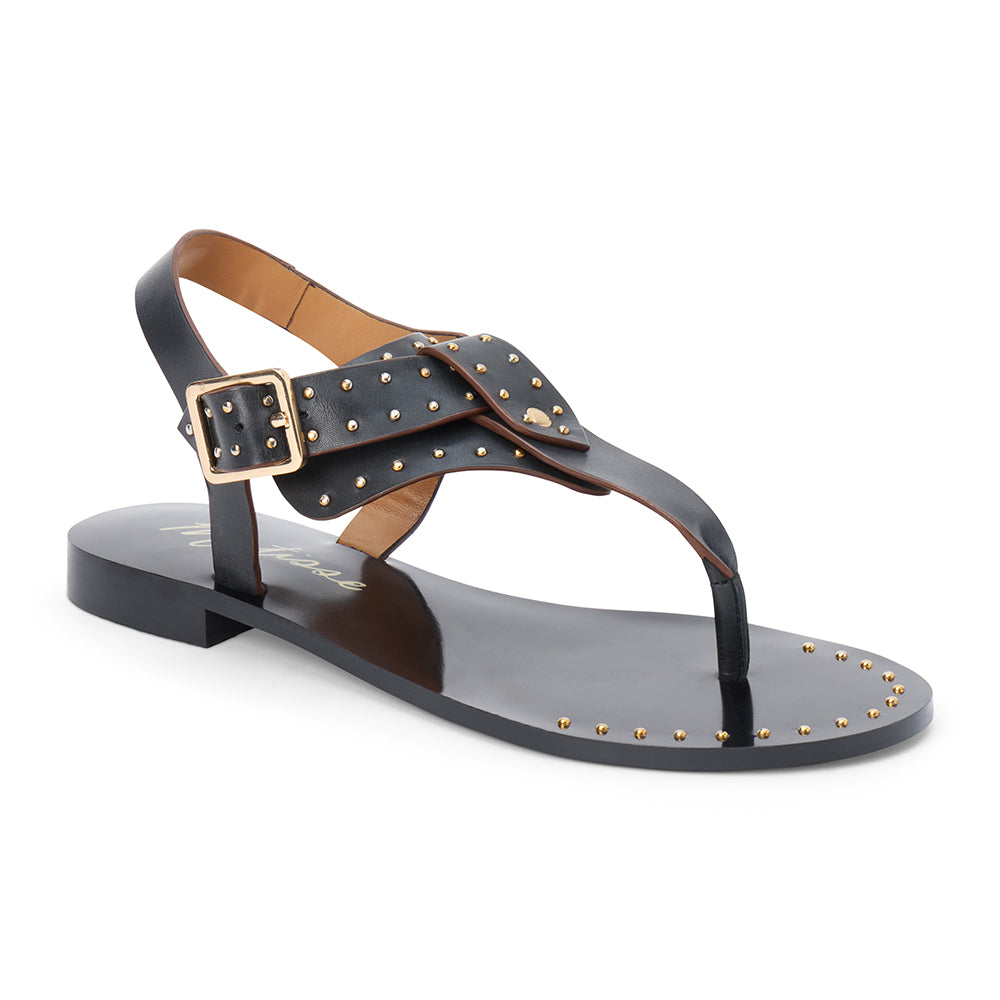 Black leather thong sandal with gold studs and buckle strap shown on a white background.