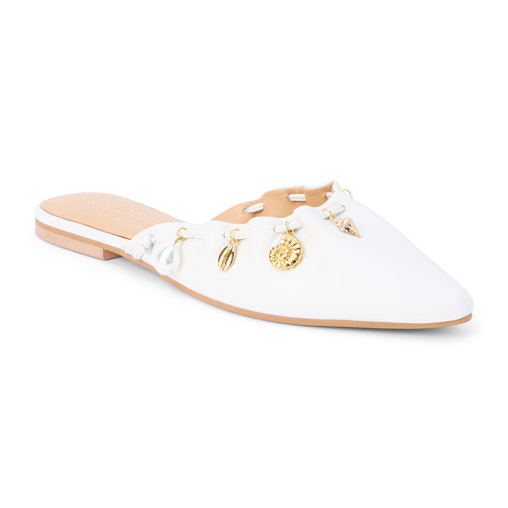 White leather mule with scalloped edges and decorative charms shown on a white background.