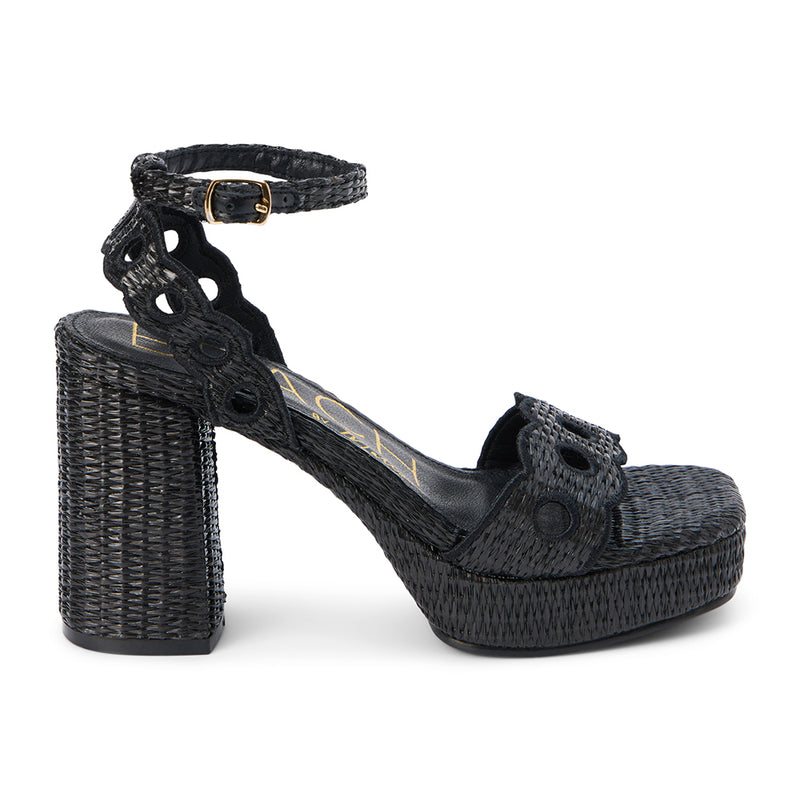 Moorea Platform Heel – Beach by Matisse – Woven black raffia platform heel featuring a scalloped vamp strap with cutout detailing, adjustable ankle strap, and chunky block heel. A retro-inspired silhouette with playful texture for elevated summer styling.