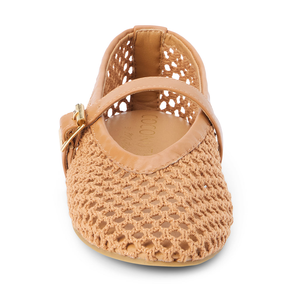 Tan woven textile ballet flat with a Mary Jane buckle strap, rounded toe, low-profile sole, and breathable crochet-style upper, shown on a white background.