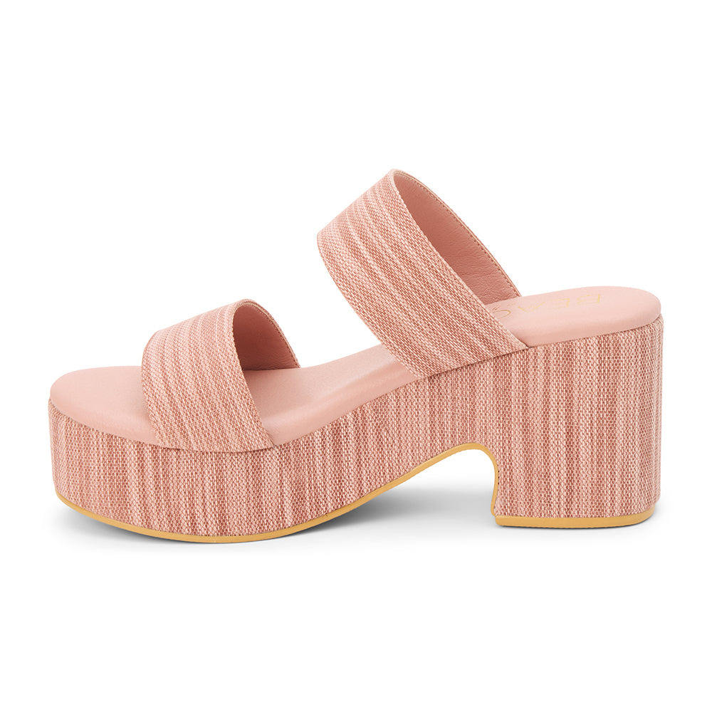 Light pink platform sandal with wide double straps and a sculpted heel, shown on a white background.