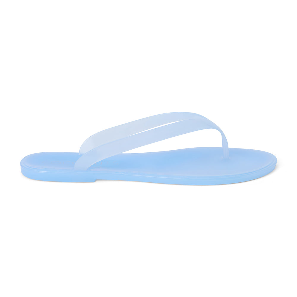 Light blue PVC jelly flip flop sandal with translucent straps, open toe, and flat sole, shown on a white background.
