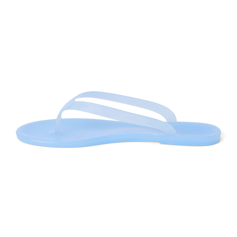 Light blue PVC jelly flip flop sandal with translucent straps, open toe, and flat sole, shown on a white background.