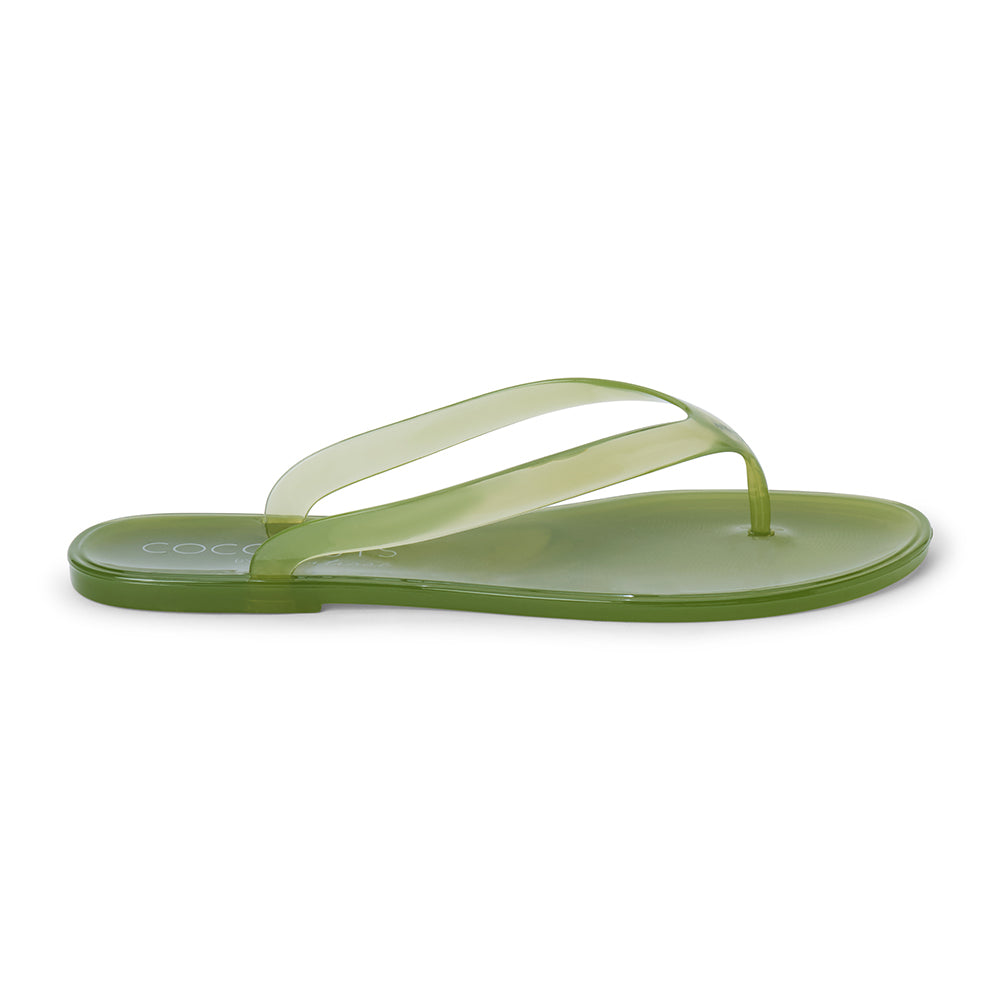 Green PVC jelly flip flop sandal with translucent straps, open toe, and flat sole, shown on a white background.