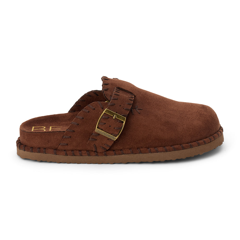 Dark brown slip-on clog with a closed toe, stitched edges, and an adjustable buckle strap, shown in a side profile on a white background.