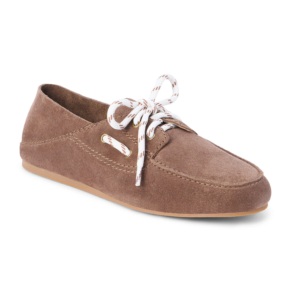 Light brown suede moc-toe boat shoe with lace-up detail and low-profile sole, shown on a white background.