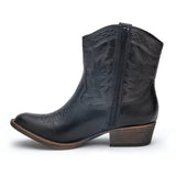Vegan black textile Western boot with decorative stitching, a pointed toe, distressed finish, and stacked block heel shown on a white background.