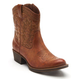 Vegan brown textile Western boot with decorative stitching, a pointed toe, distressed finish, and stacked block heel shown on a white background.