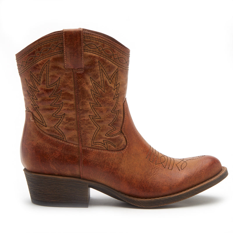 Vegan brown textile Western boot with decorative stitching, a pointed toe, distressed finish, and stacked block heel shown on a white background.