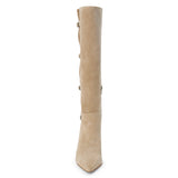 Tan suede knee-high boot with four silver-tone buckle accents, a pointed toe, and slim tan kitten heel shown on a white background.