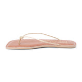 Metallic gold leather flat thong sandal with slim knotted straps and square toe, shown on a white background.