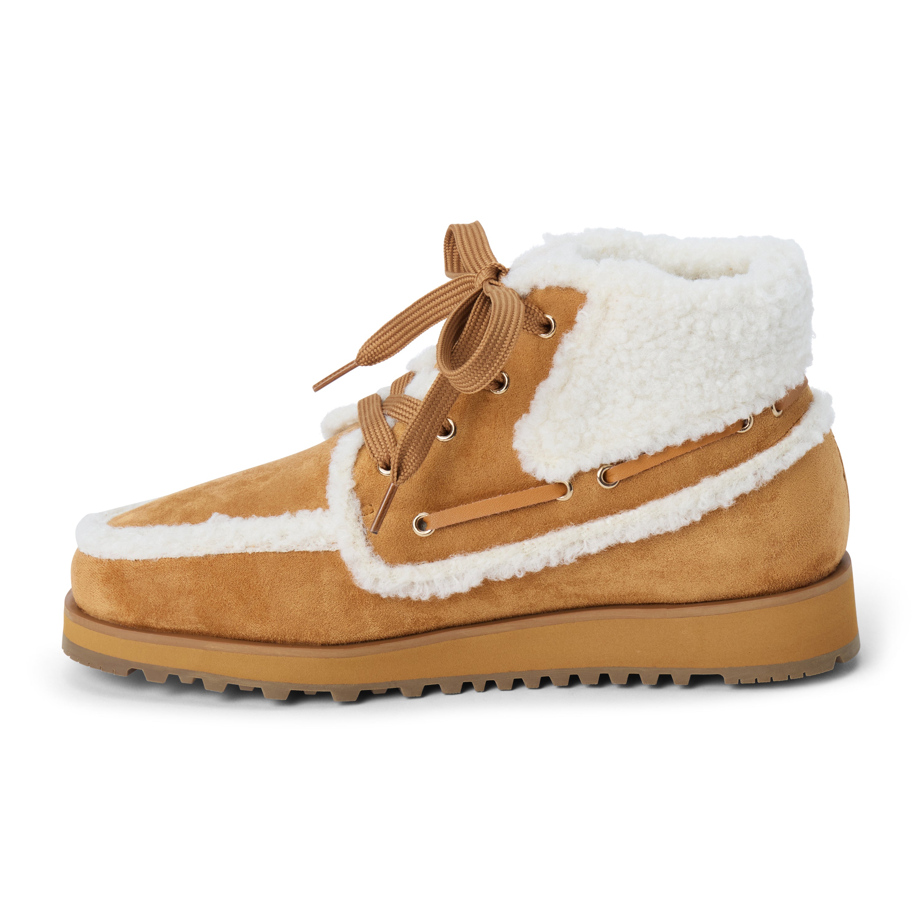 Vegan brown faux suede ankle boot with white faux-fur trim, wraparound lacing, a rounded moc toe, and lug sole shown on a white background.