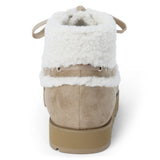 Vegan tan faux suede ankle boot with white faux-fur trim, wraparound lacing, a rounded moc toe, and lug sole shown on a white background.