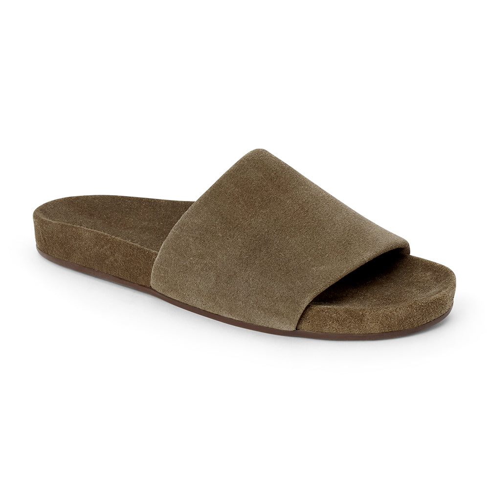 Moss green suede flat slide sandal with wide strap and molded footbed, shown on a white background.