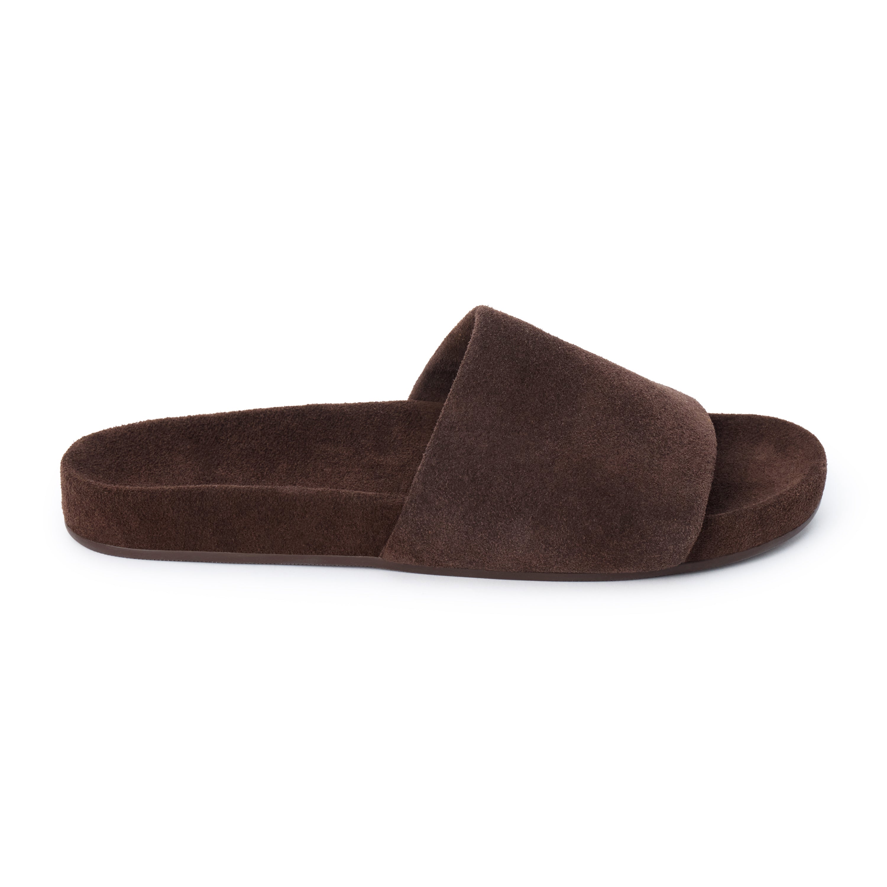 Espresso brown suede flat slide sandal with wide strap and molded footbed, shown on a white background.