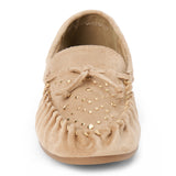 Vegan tan faux suede moccasin with a rounded moc toe, gathered stitching, decorative lacing, and gold-tone studs shown on a white background.