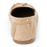 Vegan tan faux suede moccasin with a rounded moc toe, gathered stitching, decorative lacing, and gold-tone studs shown on a white background.
