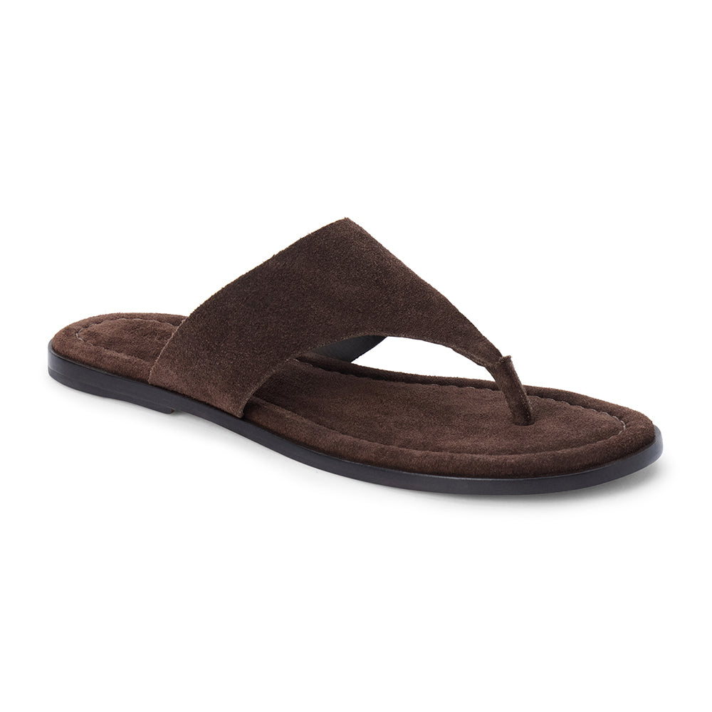 Espresso brown suede flat thong sandal with wide strap and cushioned footbed, shown on a white background.