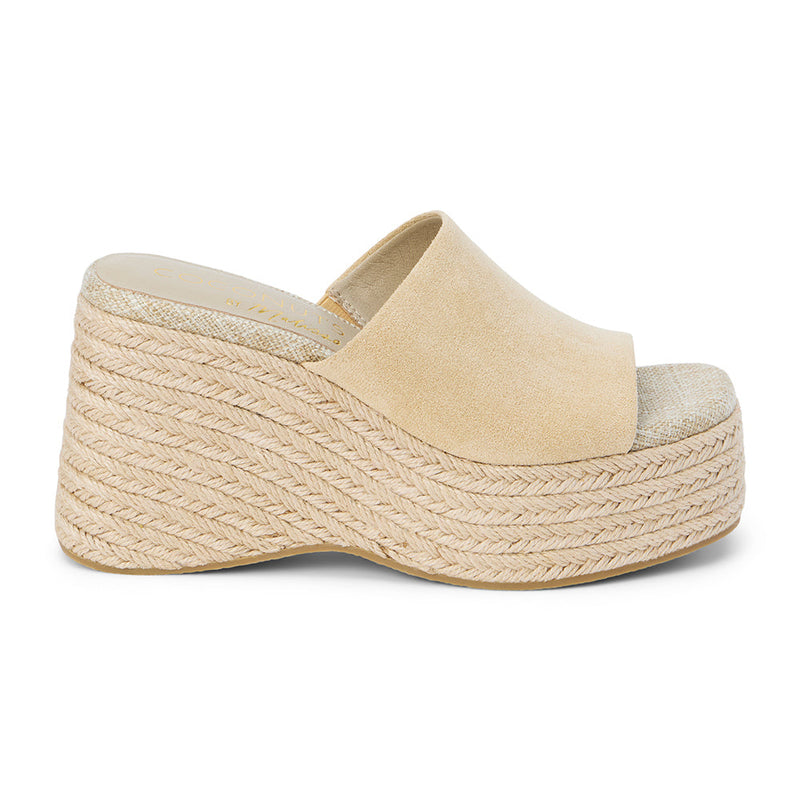 Sorrento Wedge Sandal – Coconuts By Matisse – Natural-hued sandal featuring a soft suede vamp, open toe, and sculpted espadrille wedge wrapped in braided jute. A breezy, elevated style that blends vacation ease with everyday versatility.