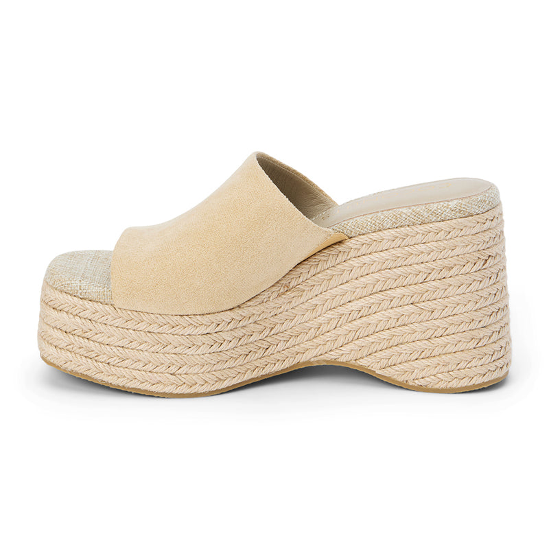 Sorrento Wedge Sandal – Coconuts By Matisse – Natural-hued sandal featuring a soft suede vamp, open toe, and sculpted espadrille wedge wrapped in braided jute. A breezy, elevated style that blends vacation ease with everyday versatility.