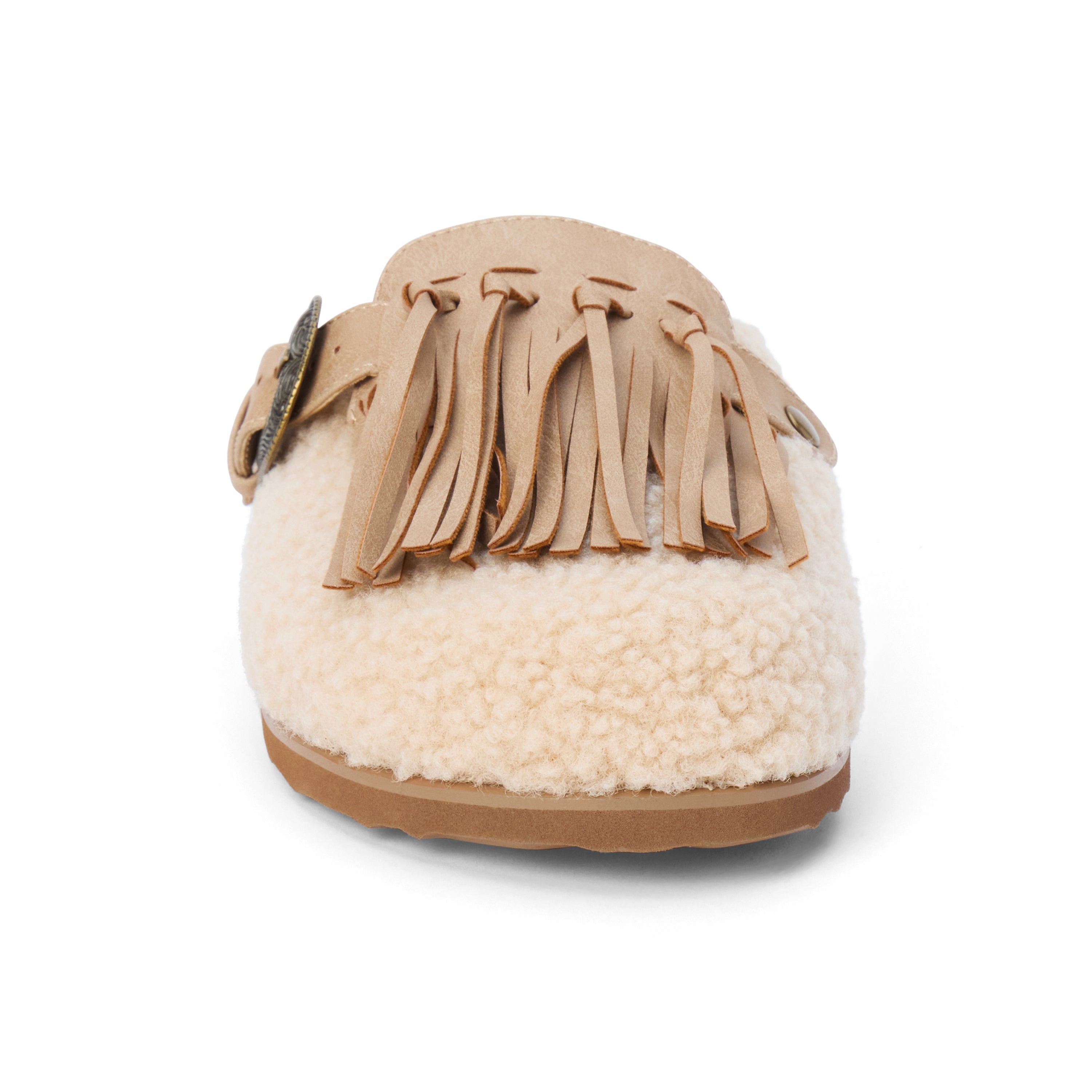 Vegan ivory faux shearling mule with a tan tassel accent, ornate bronze-tone buckle, open back, and flat sole shown on a white background.