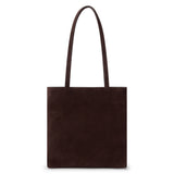 Brown suede tote bag with a rectangular body, soft matte finish, and two long matching shoulder straps shown on a white background.