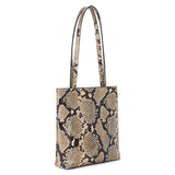 Tan and black leather tote bag with a snakeskin pattern, rectangular body, and two long matching shoulder straps shown on a white background.