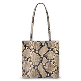 Tan and black leather tote bag with a snakeskin pattern, rectangular body, and two long matching shoulder straps shown on a white background.