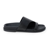 Black leather slide sandal with wide strap and open toe shown on a white background.