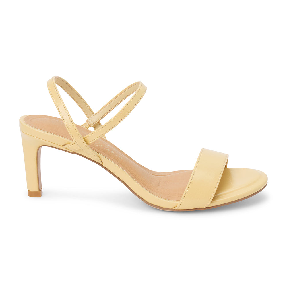 Light yellow strappy sandal with a slim heel and open toe, shown on a white background.
