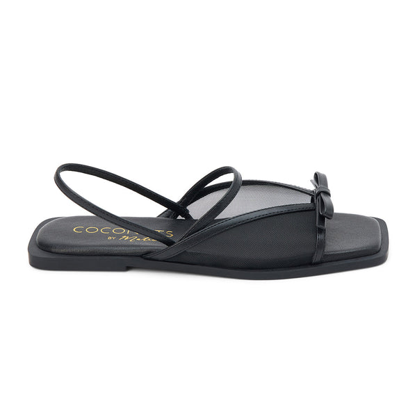 Tropea Slingback Sandal – Coconuts By Matisse – Black sandal featuring sleek mesh paneling, slender crisscross straps, and a sweet bow accent at the toe. Finished with a modern square toe and slingback fit for an effortless, elevated everyday look.
