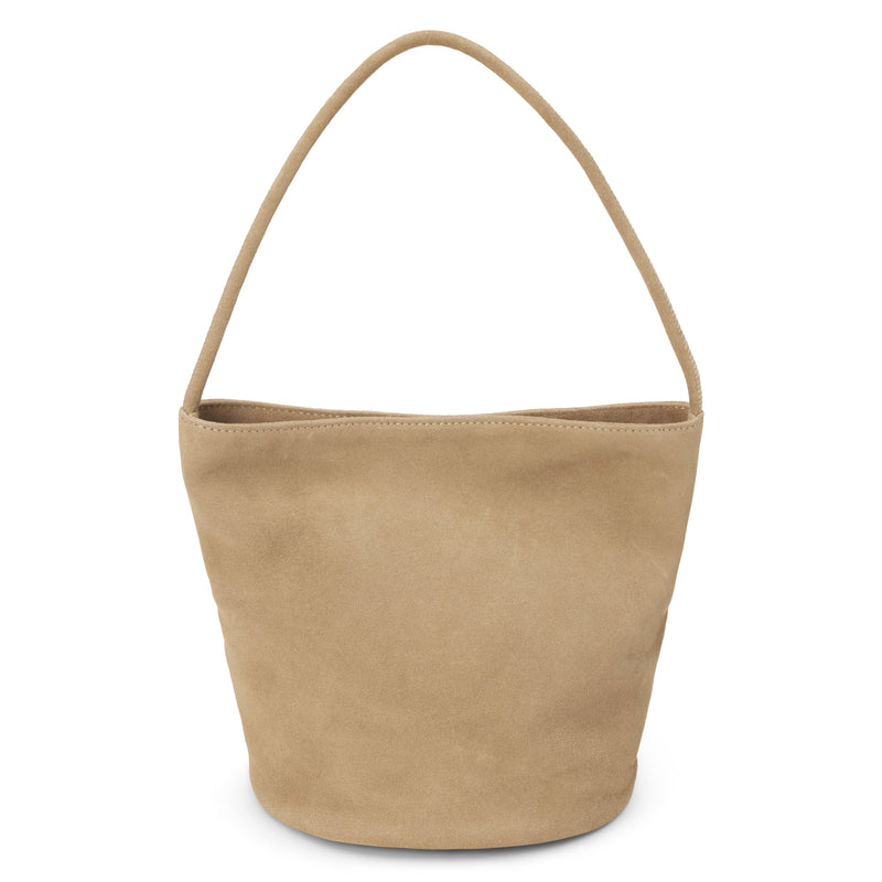 Vancouver Bucket Bag - Matisse Footwear - Minimalist bucket bag in soft beige colored suede with a seamless silhouette and a single shoulder strap. A versatile and unstructured carryall with effortless, elevated appeal.