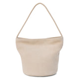 A beige suede bucket bag with a single shoulder strap and relaxed silhouette shown on a white background.