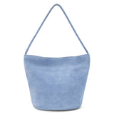 A blue suede bucket bag with a single shoulder strap and soft structure shown on a white background.