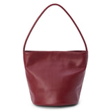 Vancouver Bucket Bag - Matisse Footwear - Minimalist bucket bag in smooth, wine red leather with a seamless silhouette and a single shoulder strap. A versatile and unstructured carryall with effortless, elevated appeal.