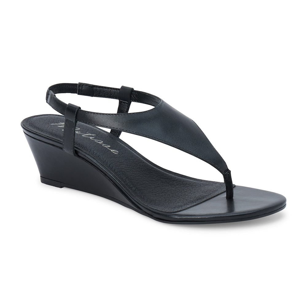 Black leather wedge sandal with slingback strap and open toe shown on a white background.